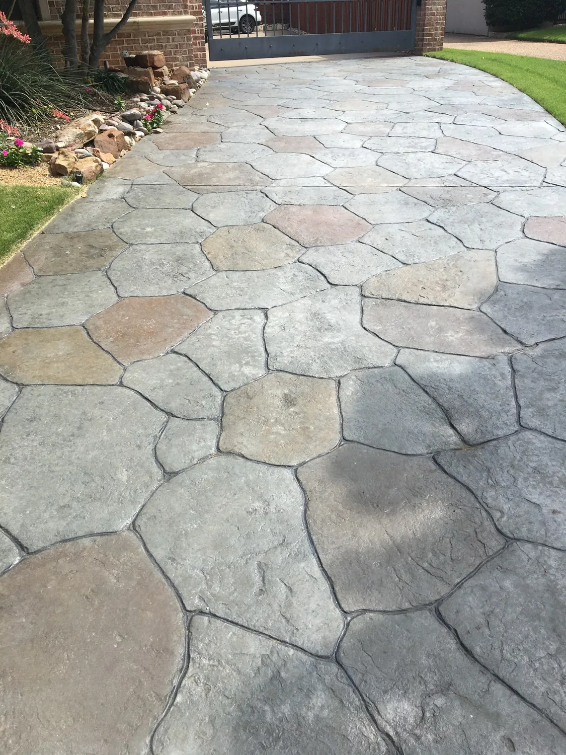 A stamped backyard transformation by Lucky&rsquo;s Concrete in Houston